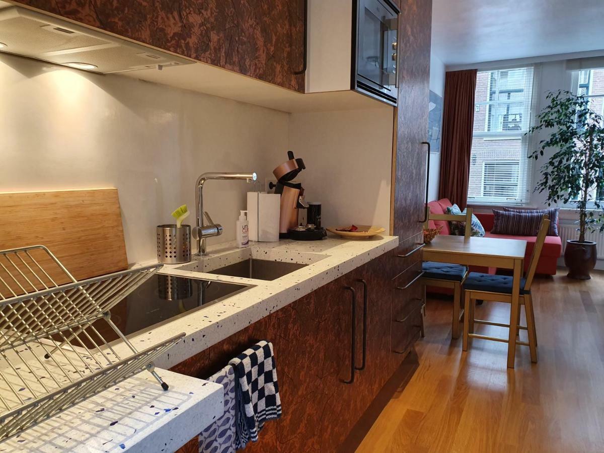 Huis Roomolen Amsterdam Bagian luar foto